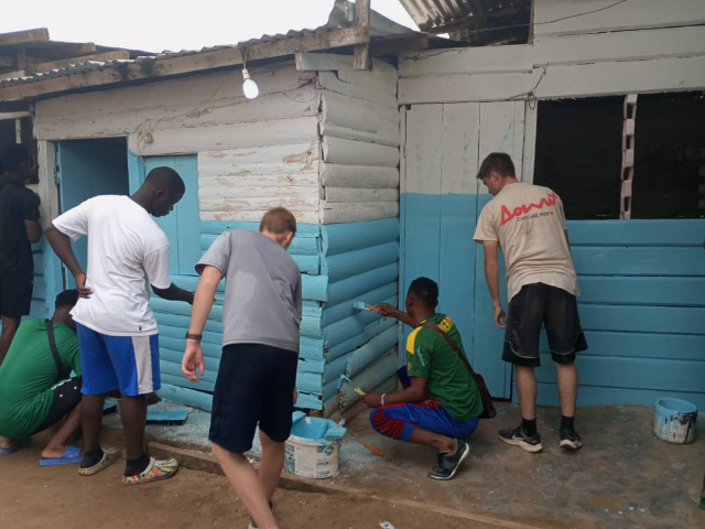 Missionaries and Members of the Church of Jesus Christ Serve at a School for Re